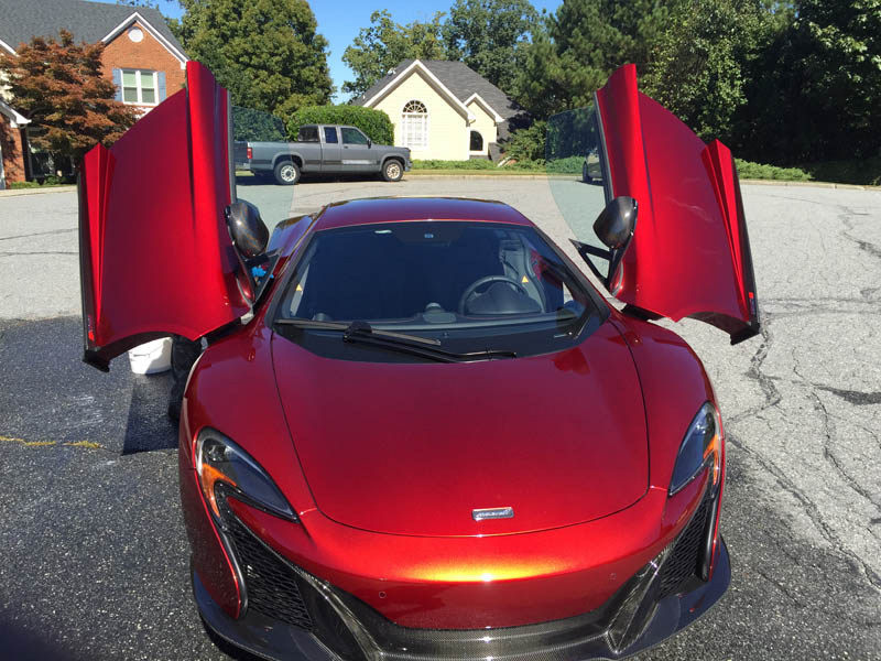 Professional auto detailing in Lawrenceville – shiny clean red car after mobile detailing service